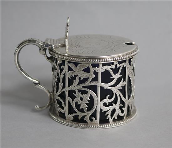 A Victorian pierced silver mustard pot by George Fox, London, 1865, height 69mm.